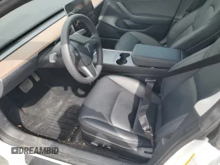 2023 Tesla Model 3 with VIN 5YJ3E1EA0PF575488, listed as a Copart auction lot 56889115 with 18,677 mi miles and Clean title. Bid and sale history available at DreamBid. Image 7.