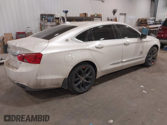 2014 Chevrolet Impala LTZ with VIN 1G1155S38EU126898, listed as a IAAI auction lot 41356611 with 196,550 mi miles and . Bid and sale history available at DreamBid. Image 4.