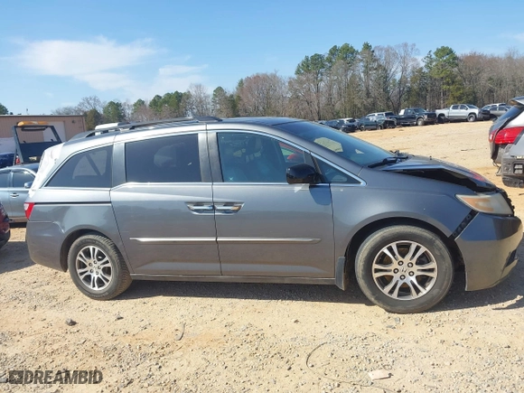 2012 Honda Odyssey EX-L with VIN 5FNRL5H64CB066240, listed as a IAAI auction lot 41792321 with 186,895 mi miles. Bid and sale history available at carsss.com. Image 12.