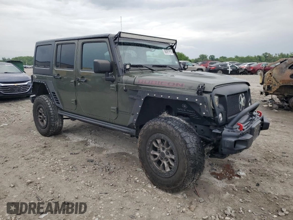 2015 Jeep Wrangler Unlimited Rubicon Hard Rock z VIN 1C4HJWFG8FL681796, wystawiony jako Copart lot #56391915 z przebiegiem 74 529 mil mil oraz Szkoda całkowita • Salvage title. Historia ofert i sprzedaży dostępna na DreamBid. Obrazek 4.