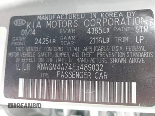 2014 Kia Optima LX with VIN KNAGM4A74E5489032, listed as a IAAI auction lot 41999733 with 83,998 mi miles. Bid and sale history available at carsss.com. Image 9.
