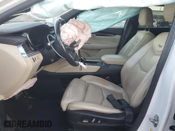 2017 Cadillac XT5 Luxury FWD with VIN 1GYKNBRS0HZ196145, listed as a Copart auction lot 83430344 with 143,012 mi miles and Salvage title. Bid and sale history available at DreamBid. Image 7.