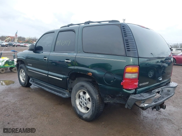 2002 Chevrolet Tahoe LT with VIN 1GNEK13Z22J154097, listed as a IAAI auction lot 41913119 with 243,978 mi miles. Bid and sale history available at carsss.com. Image 3.