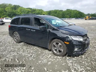 2018 Honda Odyssey Touring с VIN 5FNRL6H87JB028862, выставлен на аукционе Copart как лот 58856765 с пробегом 108 157 миль миль и Списание • Salvage title. История ставок и продаж доступна на DreamBid. Изображение 4.