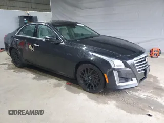 2018 Cadillac CTS Luxury AWD with VIN 1G6AX5SX3J0107605, listed as a Copart auction lot 55756235 with 113,375 mi miles and Salvage title. Bid and sale history available at DreamBid. Image 4.