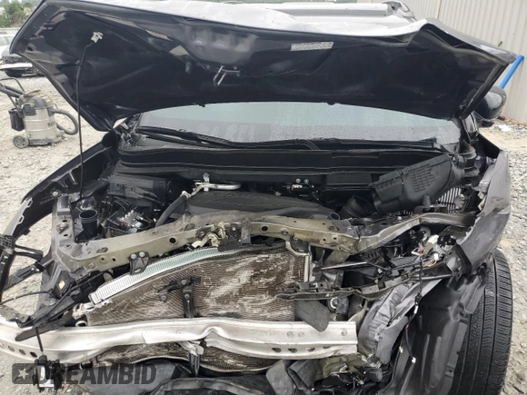 2021 Honda Passport Touring z VIN 5FNYF7H94MB005741, wystawiony jako Copart lot #57626664 z przebiegiem Nie podano mil oraz Szkoda całkowita • Salvage title. Historia ofert i sprzedaży dostępna na DreamBid. Obrazek 12.