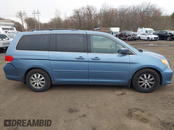 2010 Honda Odyssey EX-L with VIN 5FNRL3H79AB088793, listed as a IAAI auction lot 42008558 with 282,980 mi miles. Bid and sale history available at carsss.com. Image 13.