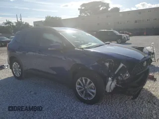 2023 Toyota Corolla Cross LE with VIN 7MUCAAAG0PV063737, listed as a Copart auction lot 86267914 with 13,740 mi miles and Salvage title. Bid and sale history available at DreamBid. Image 4.