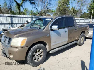 2004 Nissan Titan LE z VIN 1N6AA07BX4N569243, wystawiony jako Copart lot #53512135 z przebiegiem 324 095 mil mil oraz Szkoda całkowita • Salvage title. Historia ofert i sprzedaży dostępna na DreamBid. Obrazek 1.