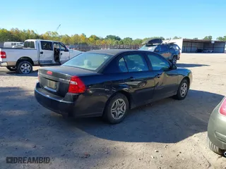 2005 Chevrolet Malibu with VIN 1G1ZS52F95F259566, listed as a IAAI auction lot 40312684 with 249,499 mi miles. Bid and sale history available at carsss.com. Image 4.