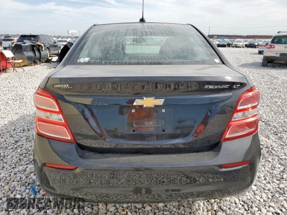 2017 Chevrolet Sonic LT with VIN 1G1JD5SH2H4176859, listed as a Copart auction lot 56787705 with 98,921 mi miles and Salvage title. Bid and sale history available at DreamBid. Image 6.