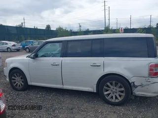 2011 Ford Flex SEL z VIN 2FMGK5CC4BBD17708, wystawiony jako IAAI lot #40367967 z przebiegiem 223 799 mil mil oraz . Historia ofert i sprzedaży dostępna na DreamBid. Obrazek 14.