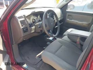 2006 Dodge Dakota SLT z VIN 1D7HE42N66S629432, wystawiony jako IAAI lot #42319636 z przebiegiem 187 086 mil mil oraz . Historia ofert i sprzedaży dostępna na DreamBid. Obrazek 12.