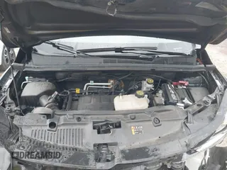 2020 Chevrolet Trax LS with VIN KL7CJKSB5LB321008, listed as a IAAI auction lot 41855276 with 77,473 mi miles. Bid and sale history available at carsss.com. Image 10.