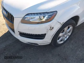2015 Audi Q7 3.0T Premium Plus with VIN WA1LGAFE0FD008032, listed as a IAAI auction lot 41690210 with 92,690 mi miles. Bid and sale history available at carsss.com. Image 6.