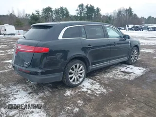 2011 Lincoln MKT with VIN 2LMHJ5AR5BBJ52058, listed as a IAAI auction lot 41305955 with 193,555 mi miles and . Bid and sale history available at DreamBid. Image 4.