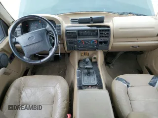 1995 Land Rover Discovery SD z VIN SALJY1241SA139966, wystawiony jako Copart lot #51668315 z przebiegiem 74 615 mil mil oraz Czysty tytuł • Clean title. Historia ofert i sprzedaży dostępna na DreamBid. Obrazek 8.