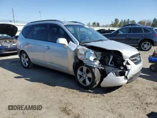 2007 Kia Rondo EX with VIN KNAFG526977104036, listed as a Copart auction lot 44372613 with 107,100 mi miles and Salvage Title. Bid and sale history available at carsss.com. Image 4.