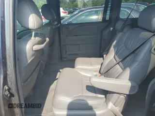 2010 Honda Odyssey EX-L z VIN 5FNRL3H73AB089714, wystawiony jako Copart lot #60276305 z przebiegiem 125 025 mil mil oraz Szkoda całkowita • Salvage title. Historia ofert i sprzedaży dostępna na DreamBid. Obrazek 11.