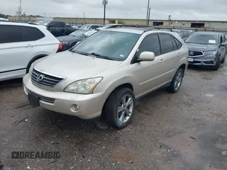 2006 Lexus RX 400h with VIN JTJHW31U060004642, listed as a IAAI auction lot 42207589 with 158,506 mi miles and . Bid and sale history available at DreamBid. Image 2.