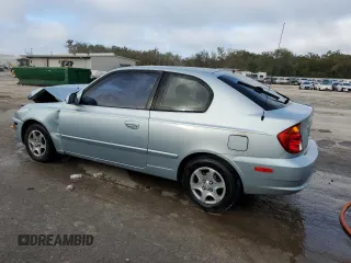 2004 Hyundai Accent GL with VIN KMHCG35CX4U293817, listed as a Copart auction lot 86087074 with 0 mi miles and Salvage Title. Bid and sale history available at carsss.com. Image 2.
