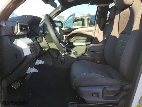 2024 Toyota Tacoma 4WD SR5 with VIN 3TMLB5JN7RM006158, listed as a Copart auction lot 44037835 with 7,243 mi miles and Salvage Title. Bid and sale history available at carsss.com. Image 7.
