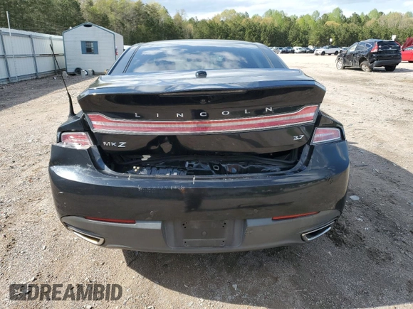 2013 Lincoln MKZ z VIN 3LN6L2GK5DR823755, wystawiony jako Copart lot #53060295 z przebiegiem 145 624 mil mil oraz Szkoda całkowita • Salvage title. Historia ofert i sprzedaży dostępna na DreamBid. Obrazek 6.