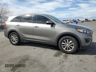 2016 Kia Sorento LX with VIN 5XYPG4A39GG086813, listed as a Copart auction lot 49260685 with 129,616 mi miles and Salvage Title. Bid and sale history available at DreamBid. Image 4.