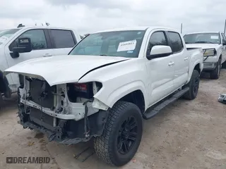 2020 Toyota Tacoma 2WD SR with VIN 5TFAX5GN5LX169778, listed as a IAAI auction lot 41691811 with 57,681 mi miles. Bid and sale history available at carsss.com. Image 18.