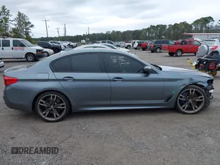 2019 BMW 5 Series M550i xDrive with VIN WBAJB9C57KB289439, listed as a IAAI auction lot 40634389 with 85,992 mi miles and . Bid and sale history available at DreamBid. Image 14.