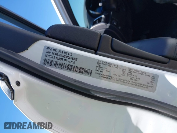 2021 Jeep Grand Cherokee Laredo E with VIN 1C4RJFAG5MC579865, listed as a IAAI auction lot 41818874 with 105,489 mi miles and . Bid and sale history available at DreamBid. Image 9.