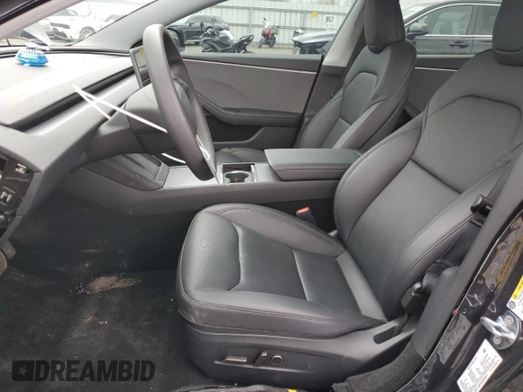 2025 Tesla Model 3 Long Range with VIN 5YJ3E1EA5SF889727, listed as a Copart auction lot 49207545 with 6,980 mi miles and Salvage Title. Bid and sale history available at carsss.com. Image 7.
