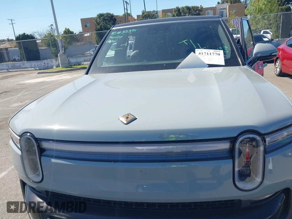 2025 Rivian R1S Adventure z VIN 7PDSGBBA1SN060468, wystawiony jako IAAI lot #41711770 z przebiegiem 2865 mil mil oraz . Historia ofert i sprzedaży dostępna na DreamBid. Obrazek 10.