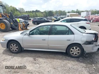2002 Honda Accord EX z VIN 1HGCG56642A161161, wystawiony jako IAAI lot #41966381 z przebiegiem 258 103 mil mil oraz . Historia ofert i sprzedaży dostępna na DreamBid. Obrazek 14.