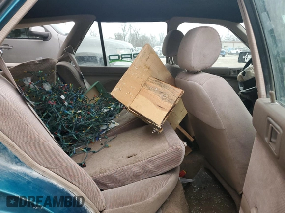 1994 Ford Escort z VIN 1FARP15J1RW125762, wystawiony jako Copart lot #85853184 z przebiegiem 75 229 mil mil oraz Szkoda całkowita • Salvage title. Historia ofert i sprzedaży dostępna na DreamBid. Obrazek 10.