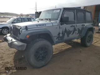 2015 Jeep Wrangler Unlimited Willys Wheeler with VIN 1C4BJWDG7FL690952, listed as a Copart auction lot 51493715 with 45,497 mi miles and Salvage Title. Bid and sale history available at DreamBid. Image 1.