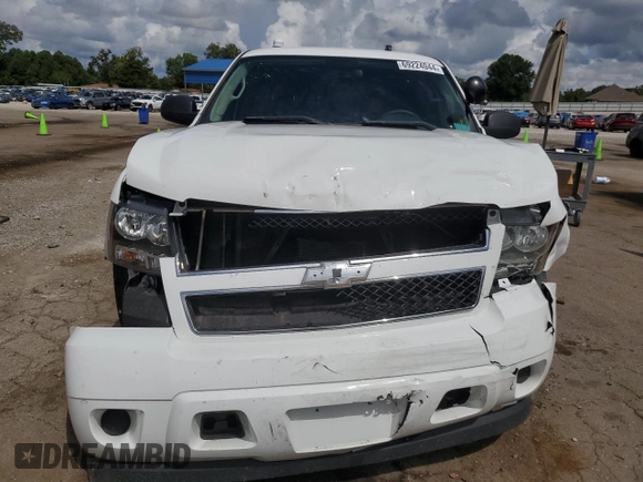 2011 Chevrolet Tahoe Commercial с VIN 1GNLC2E07BR265660, выставлен на аукционе Copart как лот 69224044 с пробегом 109 298 миль миль и Списание • Salvage title. История ставок и продаж доступна на DreamBid. Изображение 5.