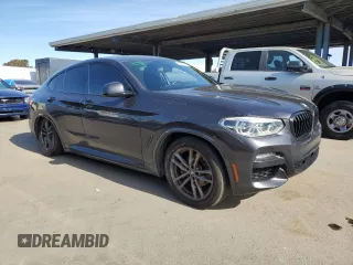 2020 BMW X4 xDrive30i with VIN 5UX2V1C04L9C32419, listed as a Copart auction lot 46427975 with 58,623 mi miles and Salvage Title. Bid and sale history available at carsss.com. Image 4.