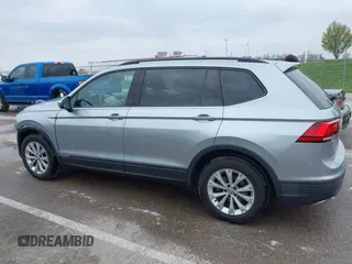 2019 Volkswagen Tiguan S with VIN 3VV1B7AX9KM110873, listed as a IAAI auction lot 42010931 with 82,745 mi miles and . Bid and sale history available at DreamBid. Image 14.