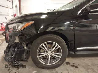2019 Infiniti QX60 Luxe with VIN 5N1DL0MMXKC565309, listed as a IAAI auction lot 42184987 with 129,985 mi miles and . Bid and sale history available at DreamBid. Image 6.