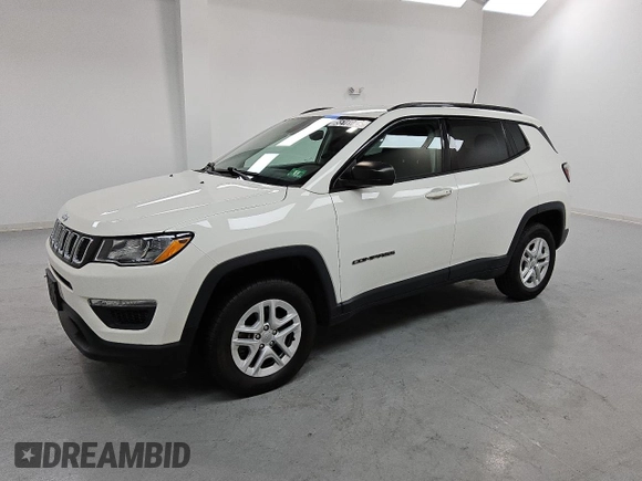 2018 Jeep Compass Sport z VIN 3C4NJDAB1JT306171, wystawiony jako Copart lot #55169745 z przebiegiem 54 489 mil mil oraz Czysty tytuł • Clean title. Historia ofert i sprzedaży dostępna na DreamBid. Obrazek 1.