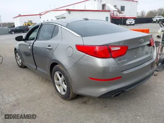 2014 Kia Optima LX with VIN 5XXGM4A72EG281892, listed as a IAAI auction lot 41940685 with 173,818 mi miles. Bid and sale history available at carsss.com. Image 3.