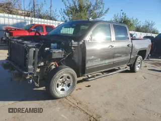 2015 Chevrolet Silverado 1500 LT with VIN 3GCPCREC1FG142021, listed as a Copart auction lot 80111304 with 143,301 mi miles and Salvage Title. Bid and sale history available at DreamBid. Image 1.
