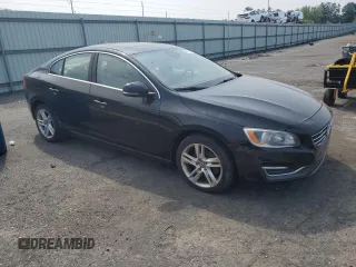 2015 Volvo S60 T5 Drive-E Premier z VIN YV126MFB0F1305289, wystawiony jako Copart lot #59939795 z przebiegiem 90 678 mil mil oraz Czysty tytuł • Clean title. Historia ofert i sprzedaży dostępna na DreamBid. Obrazek 4.