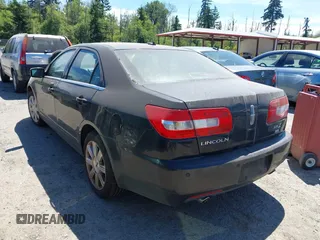2009 Lincoln MKZ with VIN 3LNHM28T39R613353, listed as a IAAI auction lot 42644600 with 243,902 mi miles and . Bid and sale history available at DreamBid. Image 3.