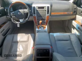 2009 Cadillac STS RWD z VIN 1G6DW67V390103790, wystawiony jako Copart lot #56596915 z przebiegiem 57 537 mil mil oraz Czysty tytuł • Clean title. Historia ofert i sprzedaży dostępna na DreamBid. Obrazek 8.