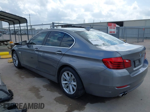 2014 BMW 5 Series 528i with VIN WBA5A5C52ED500696, listed as a IAAI auction lot 41708462 with 121,592 mi miles. Bid and sale history available at carsss.com. Image 3.