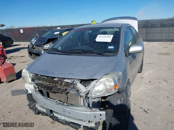 2012 Toyota Yaris with VIN JTDBT4K35CL038860, listed as a IAAI auction lot 41254384 with 161,536 mi miles. Bid and sale history available at carsss.com. Image 18.