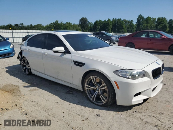 2014 BMW M5 with VIN WBSFV9C54ED097879, listed as a Copart auction lot 61380464 with 78,367 mi miles and Salvage Title. Bid and sale history available at carsss.com. Image 4.