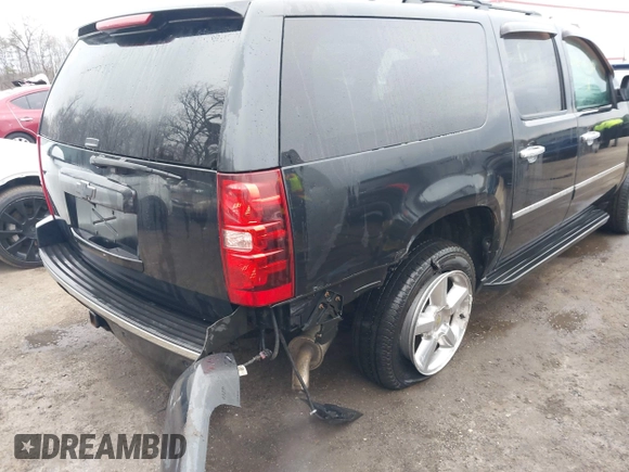 2012 Chevrolet Suburban LTZ with VIN 1GNSKKE74CR257156, listed as a IAAI auction lot 41486869 with 168,049 mi miles. Bid and sale history available at carsss.com. Image 6.